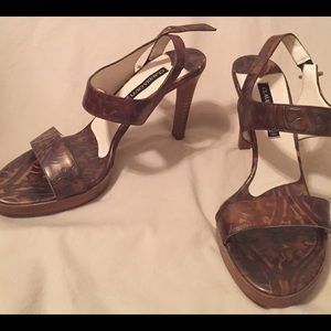 Brown Claudia Ciuti heels with gold accents